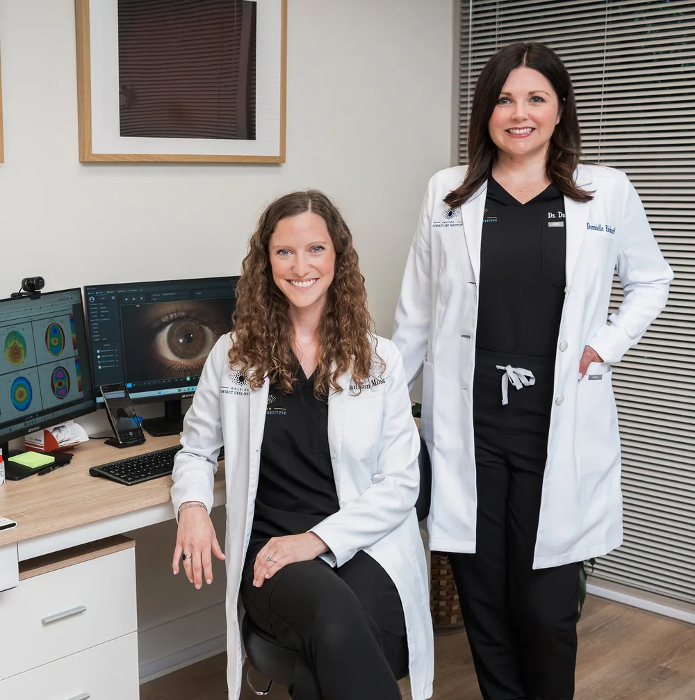 Dr. Dannielle Richard and Dr. Madison Moss evaluating ortho-k for adults